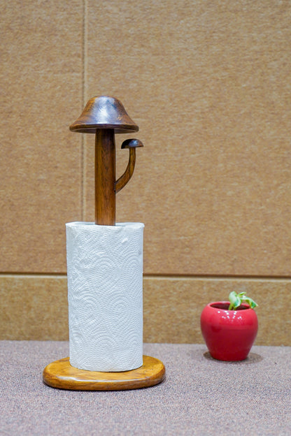 Wooden paper towel holder with a roll of paper towels on a neutral background