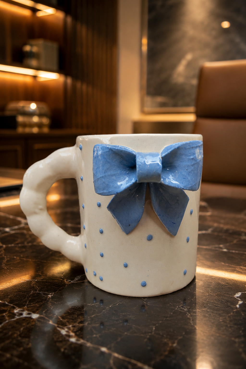 SAAG Bella Bow Mug — premium ceramic mug with delicate bow detail (view 1)